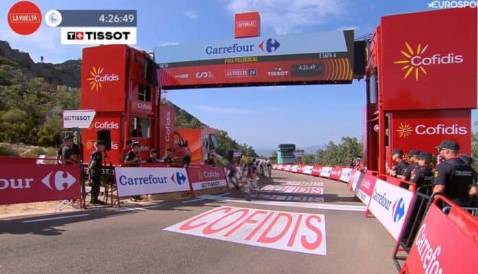 primoz roglic remporte la premiere etape au sommet de la vuelta 2024 et prend le maillot rouge